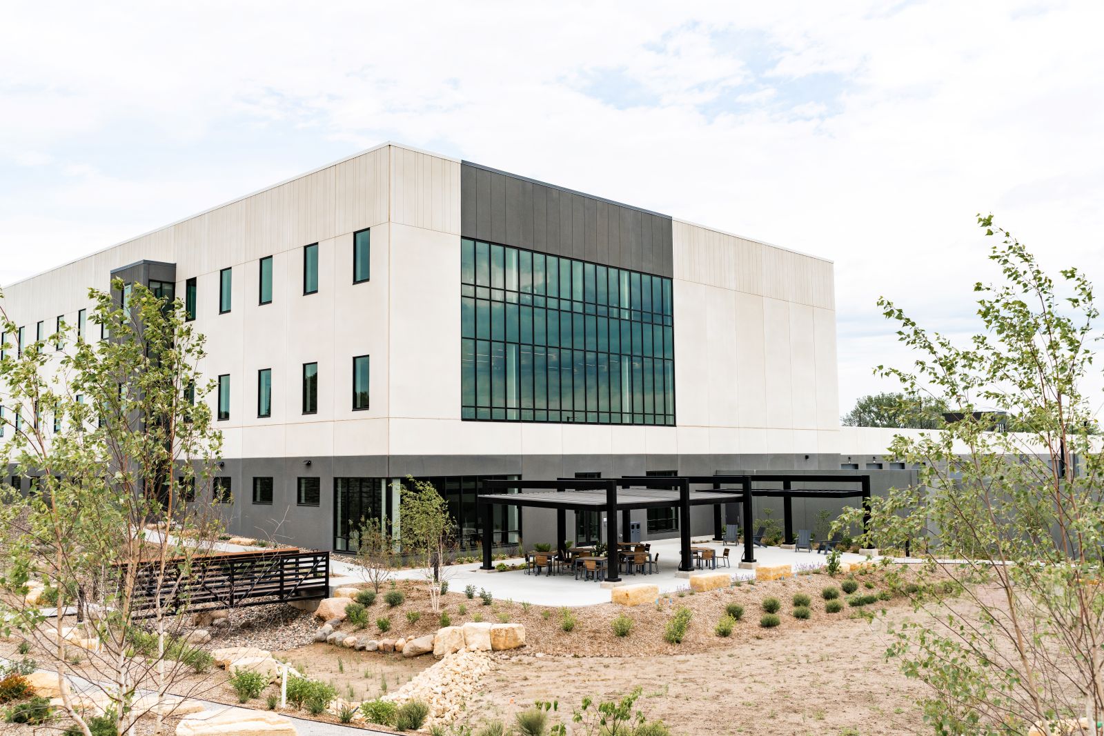 Exterior of the Xcel Energy St. Paul Service Center at The Heights development, featuring the Darcy groundwater geothermal system