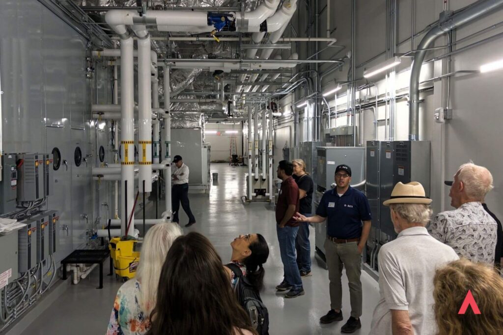 group of people on a site visit to university of minnesota offsite collections facility
